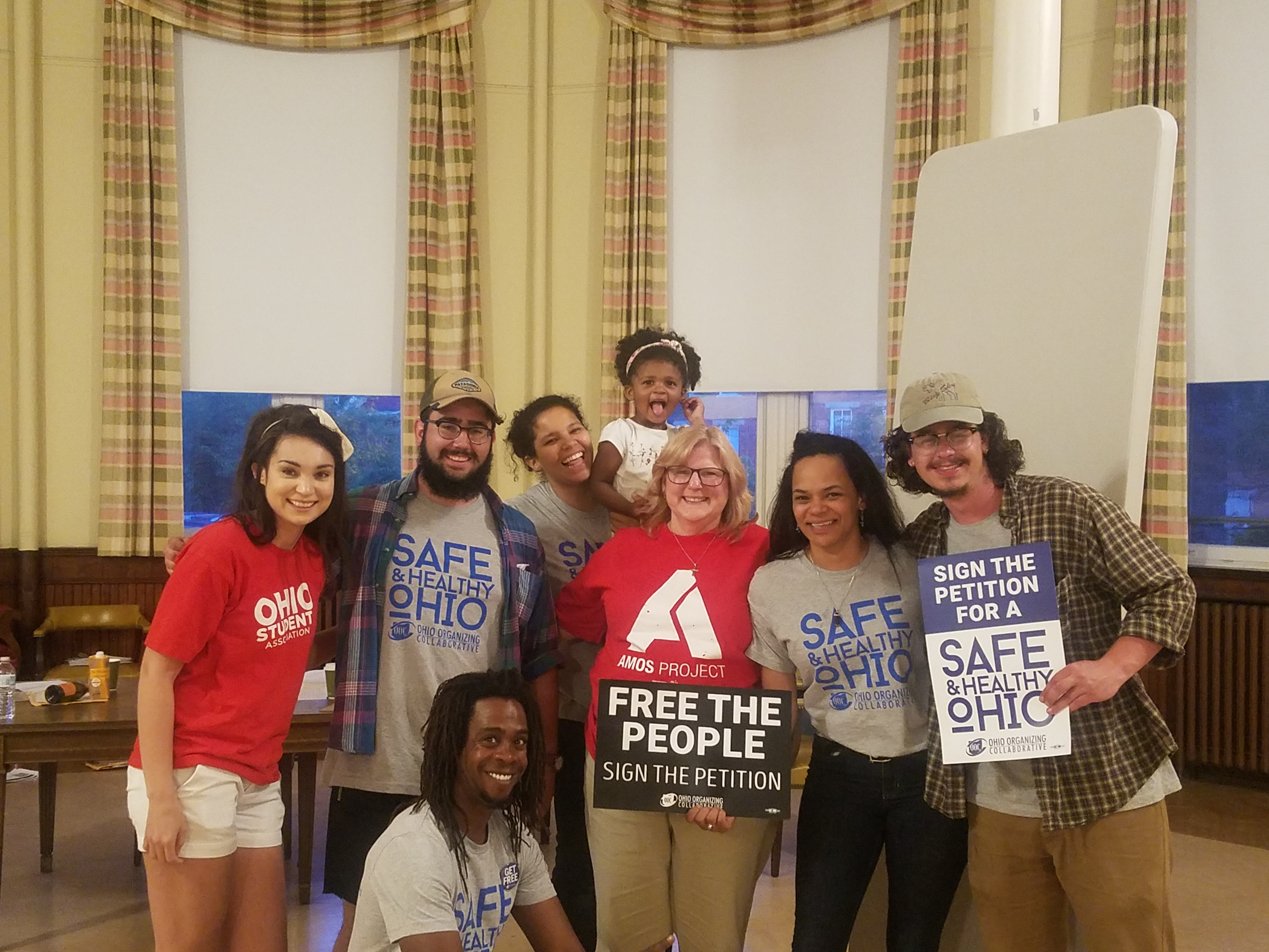 Elizabeth Hopkins, second from right, and staff members from the AMOS Project and Ohio Organizing Collaborative after a signature-collection push on primary Election Day, May 8. 