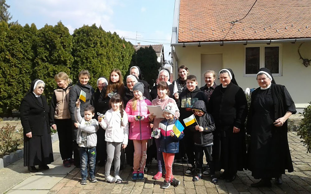 Basilian Sisters in Osijek, Croatia, with refugee mothers and children from Ukraine (Courtesy of the Basilian Sisters)