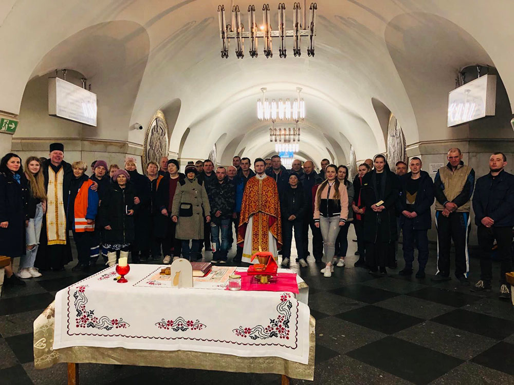 Participants in a liturgy at an underground station in Kyiv, Ukraine (Courtesy of the Basilian Sisters)