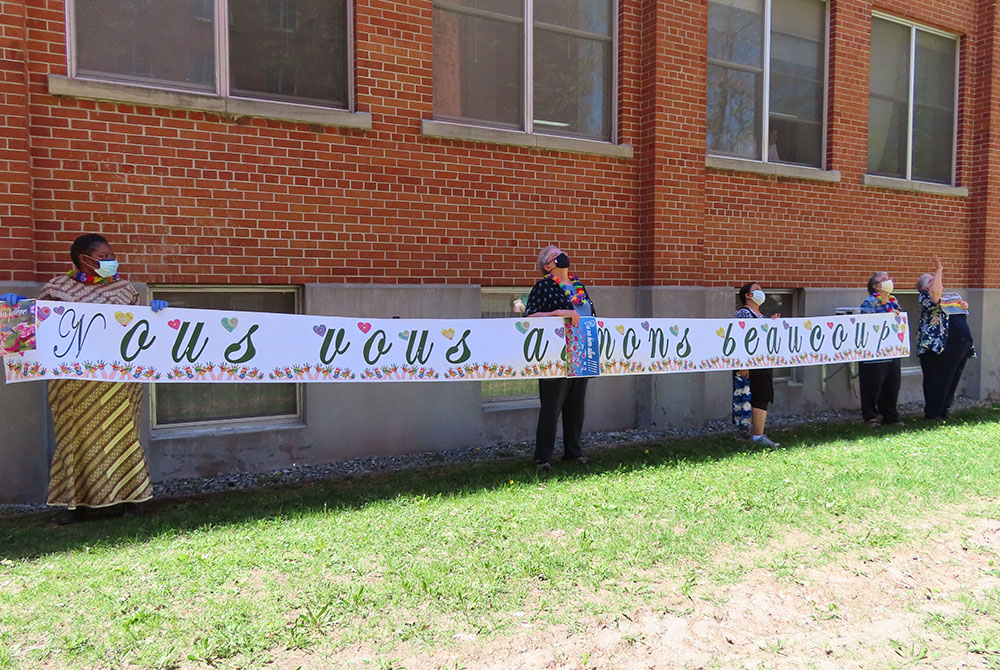 Sisters of Providence held a banner to let other sisters in the community who were isolated because of COVID-19 restrictions know they were appreciated and loved. (Courtesy of the Sisters of Providence) Sisters of Providence held a banner to let other sisters in the community who were isolated because of COVID-19 restrictions know they were appreciated and loved. (Courtesy of the Sisters of Providence)
