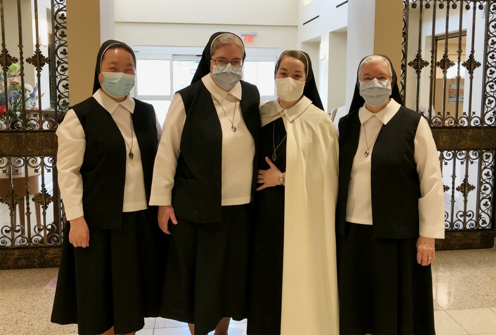 From left, Sisters of Christian Charity Clara, Ann Marie, Mary Amata and Gerardine celebrate the perpetual profession of Sister Mary Amata Aug. 15 in Mendham, New Jersey. (Provided photo) From left, Sisters of Christian Charity Clara, Ann Marie, Mary Amata and Gerardine celebrate the perpetual profession of Sister Mary Amata Aug. 15 in Mendham, New Jersey. (Provided photo)