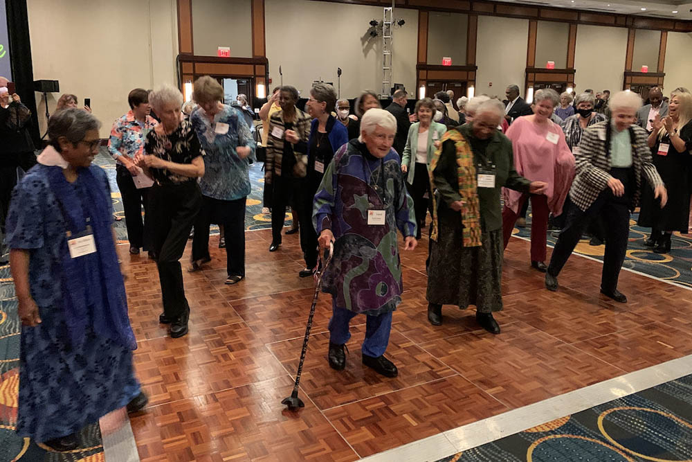 Women religious and other guests at Network's 50th anniversary gala take to the dance floor after the conclusion of the gala program April 22 in Washington, D.C. (GSR photo/Joshua J. McElwee)