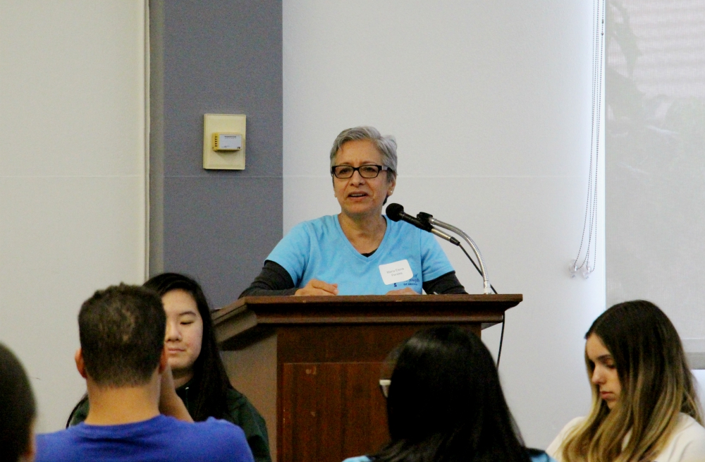 Maria Elena Perales, director of the St. Joseph Justice Center in Orange, California, gives opening remarks to participants in the Sept. 28 day of service. (Courtesy of the Sisters of St. Joseph of Orange) Maria Elena Perales, director of the St. Joseph Justice Center in Orange, California, gives opening remarks to participants in the Sept. 28 day of service. (Courtesy of the Sisters of St. Joseph of Orange)