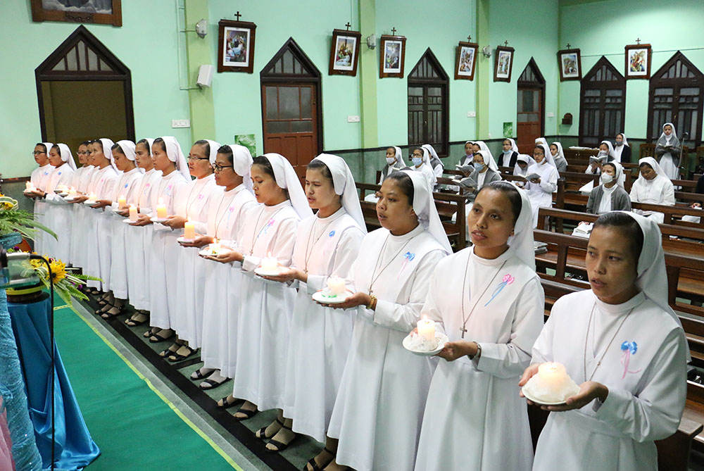 The 15 temporary professed Salesian Sisters of the Immaculate Heart of Mary are shown in a prayer moment at the beginning of their one-year intensive juniorate studies at the auxilium provincial house in the Shillong province of India, Aug. 31, 2021.