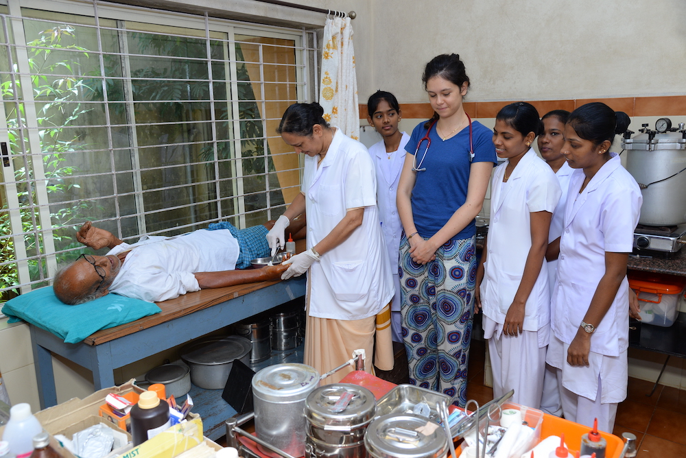 Sisters in India are helping to provide health care. The Sisters of the Little Flower of Bethany assist in a health center in Naini, a twin city of Allahabad, India. (Courtesy of the Women's Religious Conference India)