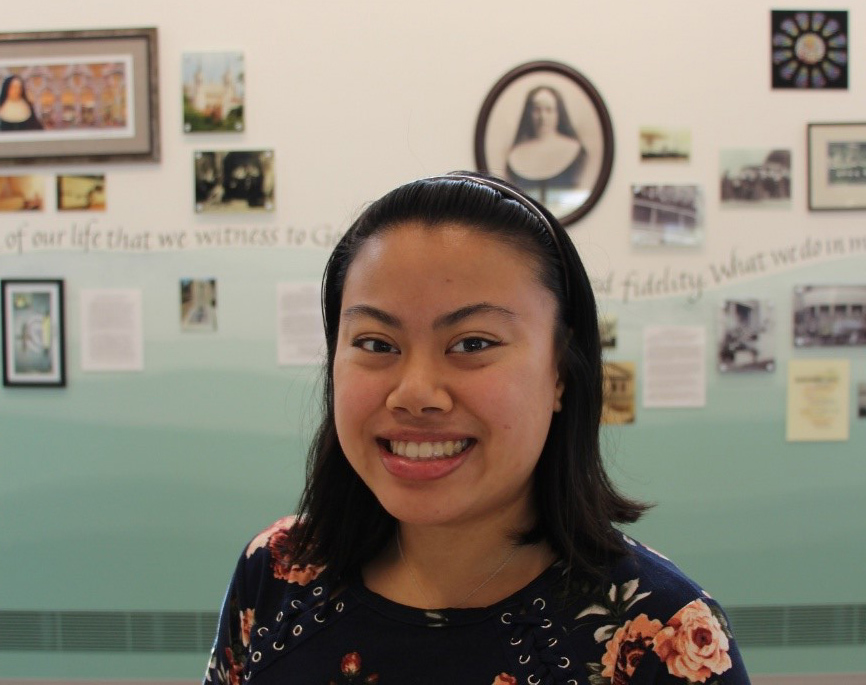 Me in the Heritage Room with the inspiring history of the Sisters of St. Joseph of Orange, California, behind me (Courtesy of the Sisters of St. Joseph of Orange)