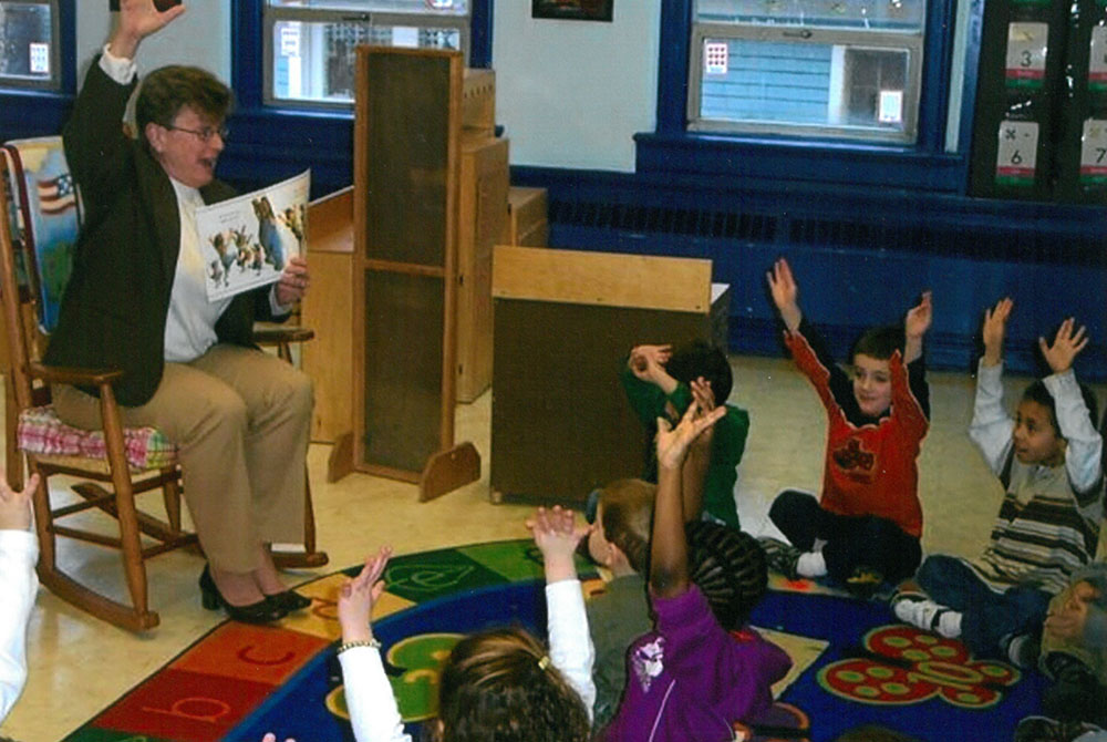 Sr. Jane Herb reads to a class in 1998, when she was the superintendent of Catholic schools in the Diocese of Albany, New York. (Courtesy of Jane Herb)