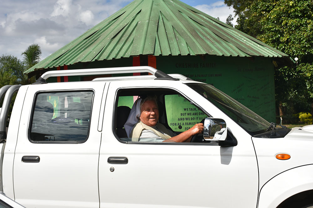 Sr. Judith Bozek's goes on her busy daily errands to buy medicine, food and groceries for the elderly and orphans at her foster home. (Derrick Silimina)