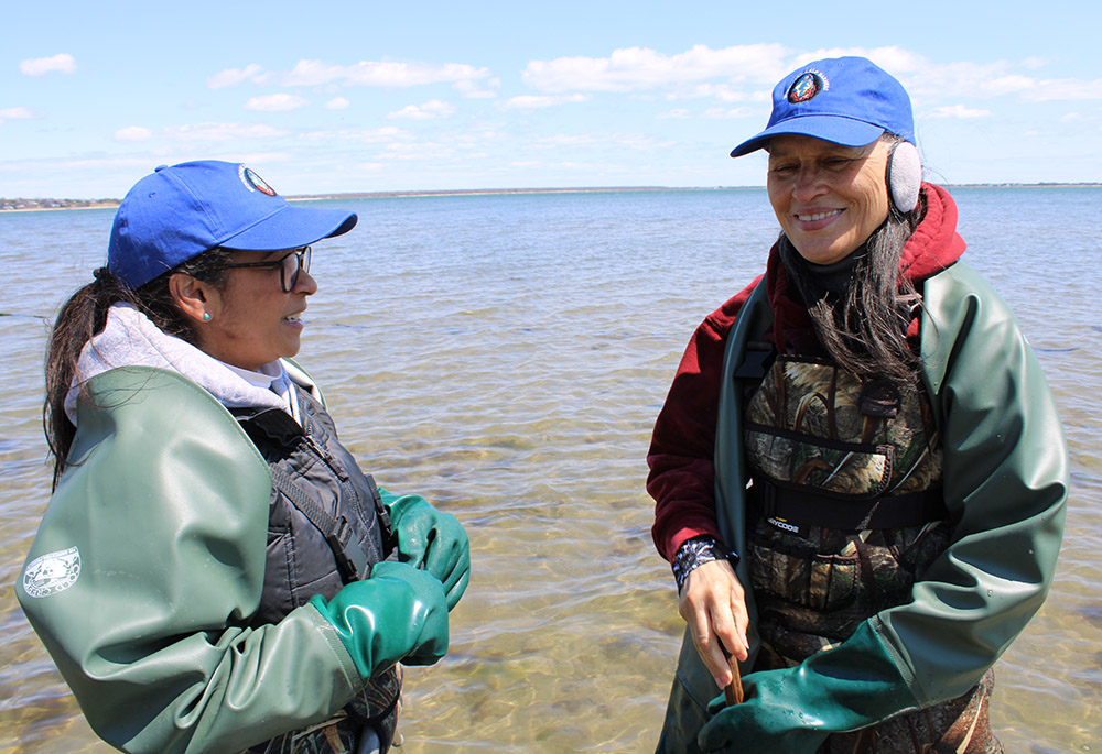 Shinnecock members Donna Collins-Smith, right, and Danielle Hopson Begun are pictured as they prepare to check on kelp growth in Shinnecock Bay on eastern Long Island. (GSR photo/Chris Herlinger)