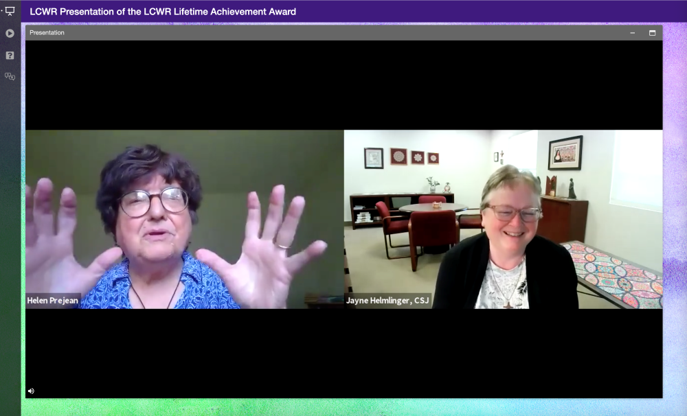 St. Joseph Sr. Helen Prejean, left, accepts a Lifetime Achievement Award from Sr. Jayne Helmlinger, then past-president of the Leadership Conference of Women Religious, on Aug. 13, the last day of the 2021 LCWR assembly. (GSR screenshot)