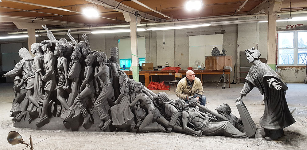 Canadian artist Timothy Schmalz created a 20-foot bronze sculpture, titled "Let the Oppressed Go Free," depicting St. Josephine Bakhita freeing victims of human trafficking. (Courtesy of Timothy Schmalz)