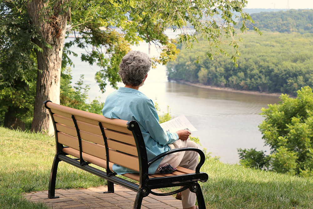 Sr. Lou Anglin Sr. Lou Anglin of the Sisters of Charity of the Blessed Virgin Mary sits outdoors in quiet reflection in Dubuque, Iowa, as part of her participation in the Leadership Conference of Women Religious' 2020 virtual assembly. (Courtesy of LCWR)