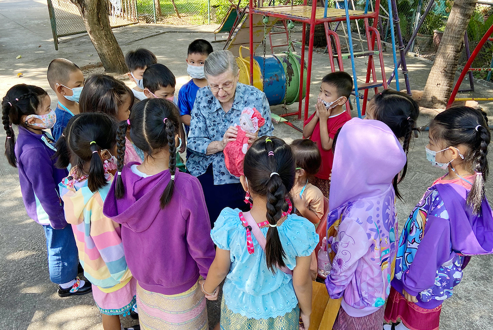 Good Shepherd Sr. Louise Horgan with children at the Fatima Self Help Centre in Bangkok, Thailand (Provided photo)