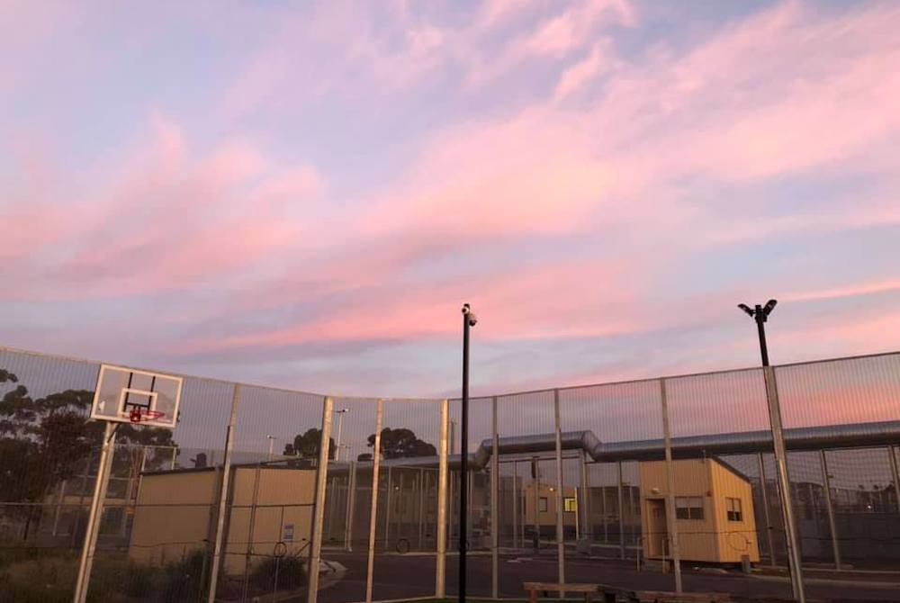 Photo shared with Sr. Rita Malavisi showing the sunrise from inside Melbourne Immigration Transit Accommodation, a detention center in Australia (Photo by a detainee)