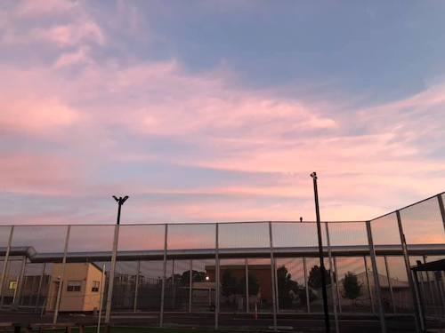 View of a sunrise from inside the Melbourne Immigration Transit Accommodation centre (Photo by a detainee)