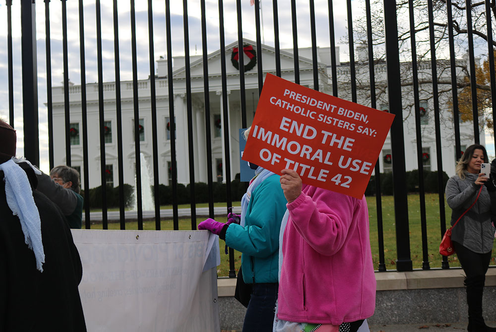 More than 80 Catholic sisters and other advocates gathered Dec. 3 at the White House to protest the Biden administration's plans to reinstate the "remain in Mexico" policy that forces asylum seekers at the U.S. southern border to wait outside the country.