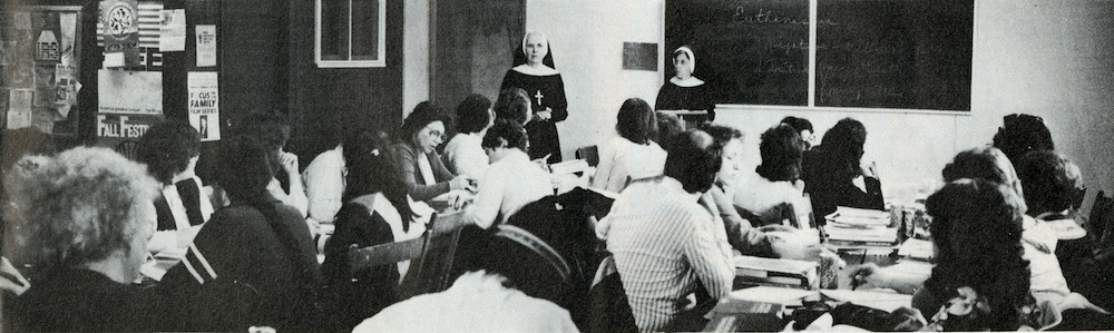 St. Joseph Sr. Mary Christine Taylor, standing left, on a 1984 visit to a college class she helped start on the St. Regis Mohawk Reservation (Courtesy of Catholic Extension Magazine)
