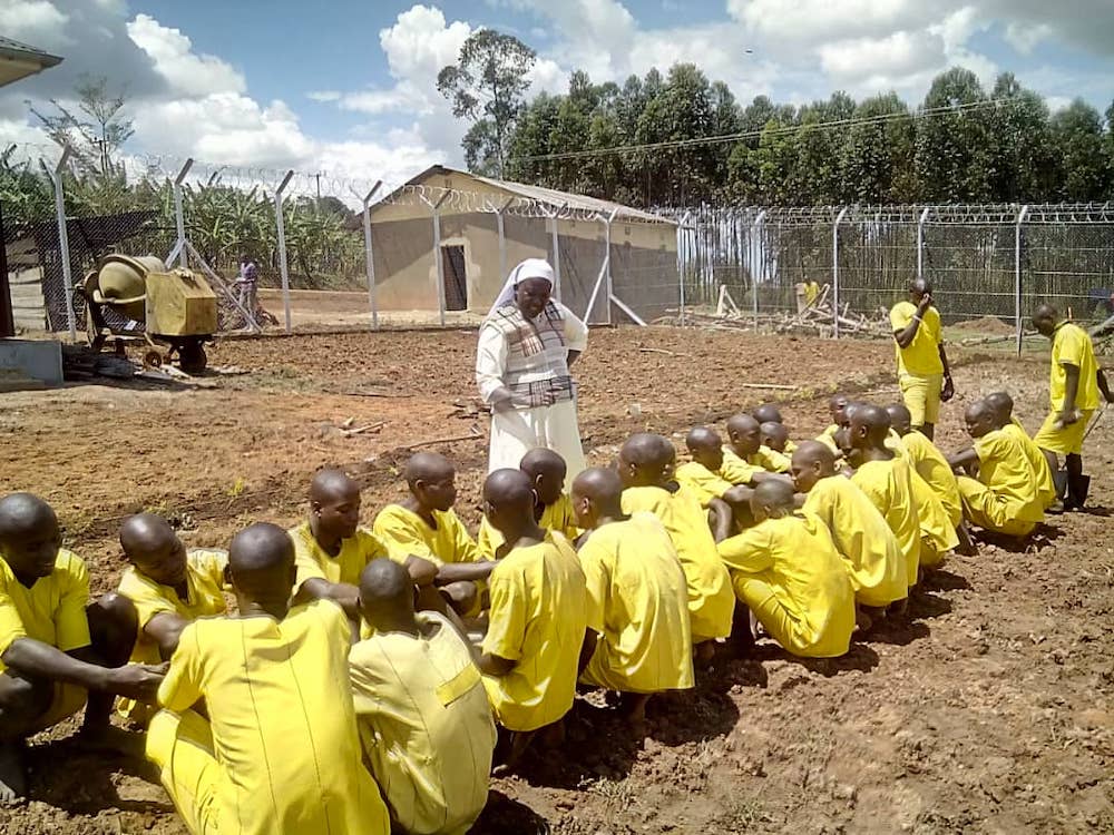 Sr. Mary Grace Akiror counsels prisoners in Sheema District in western Uganda, where she had gone to monitor the progress of prison construction. (Gerald Matembu) Sr. Mary Grace Akiror counsels prisoners in Sheema District in western Uganda, where she had gone to monitor the progress of prison construction. (Gerald Matembu)