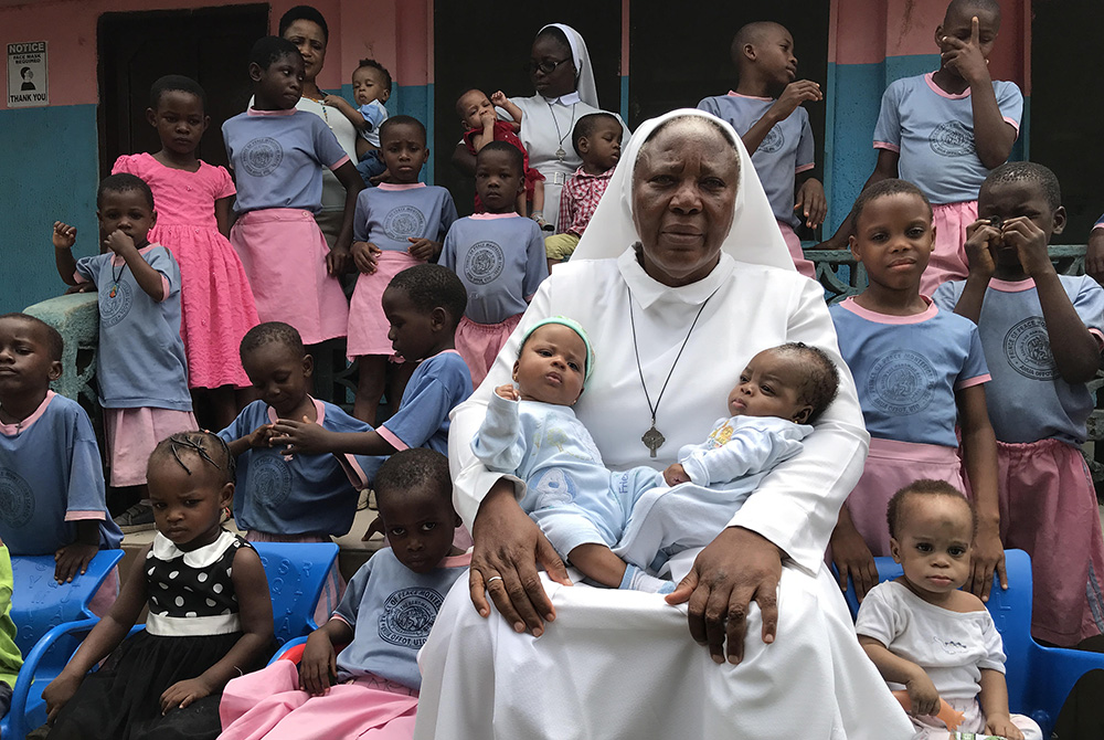 Matilda Inyang Sr. Matilda Inyang with some of the children at the Mother Charles Walker Children Home, which cares for malnourished and homeless children from the streets of Uyo, Nigeria (Valentine Iwenwanne)
