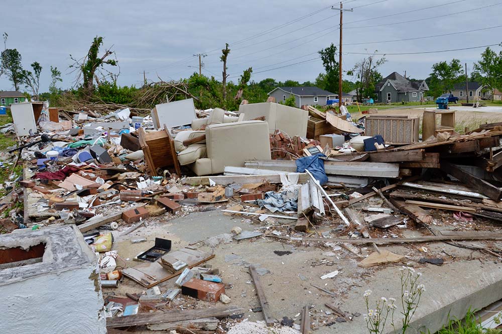 Only the foundation and debris of a home that took a direct hit from a December tornado in Mayfield, Kentucky, remain almost six months later. (GSR photo/Dan Stockman)