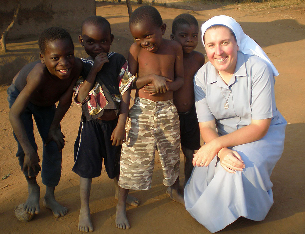 Canossian Sr. Melissa Dwyer with village children in Balaka, Malawi, in 2009 (Courtesy of Melissa Dwyer)