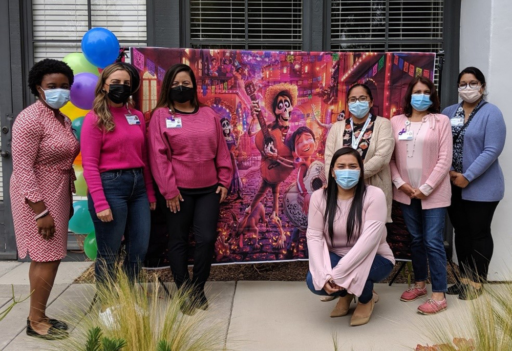 From left: Cindy Emenalo, Teresa Jones, Rebecca Cervantes, Nadia Moreno, Maria Peralta-Sanchez, Jenny Sanchez, and Jennifer Romo, all of whom work at Mission Hospital, wear pink in October 2021 to mark Breast Cancer Awareness Month. (Mission Hospital)