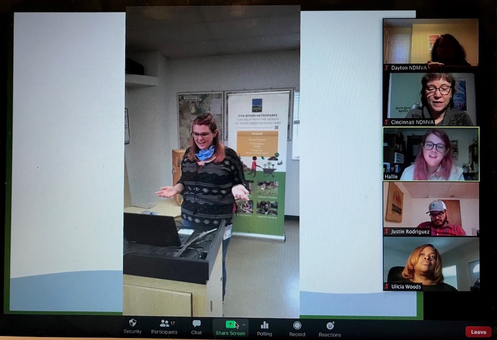Notre Dame Mission Volunteers-AmeriCorps members Hallie Hayden, center, discusses her role as a naturalist assistant and green schoolyards assistant with other team members through a Zoom call. Notre Dame Mission Volunteers-AmeriCorps members Hallie Hayden, center, discusses her role as a naturalist assistant and green schoolyards assistant with other team members through a Zoom call.