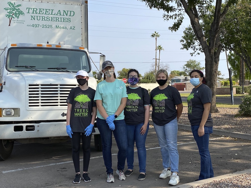 From left: Nicole Chasey, Kirsten Frey, Lurissa Carbajal, Kenna Gottschalk and Rachelle Crespo, Notre Dame Mission Volunteer-AmeriCorps members in Phoenix, volunteer Oct. 17 with Trees Matter, which distributes shade trees and conducts classes on caring f From left: Nicole Chasey, Kirsten Frey, Lurissa Carbajal, Kenna Gottschalk and Rachelle Crespo, Notre Dame Mission Volunteer-AmeriCorps members in Phoenix, volunteer Oct. 17 with Trees Matter, which distributes shade trees and conducts classes on caring f