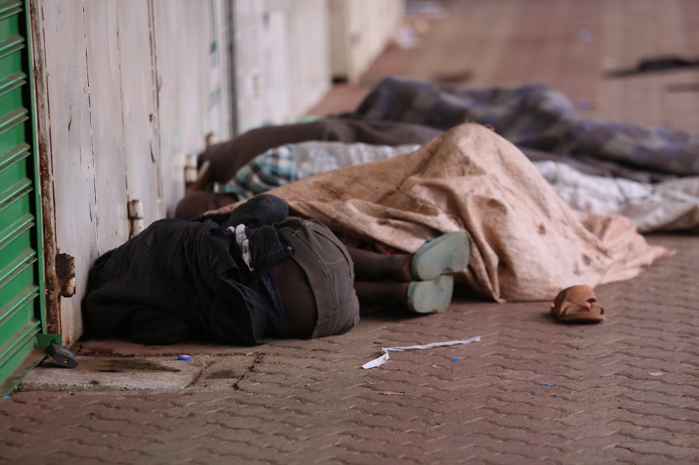 Homeless children sleep, huddling close to increase warmth, on the streets of Nairobi, Kenya. They will take turns staying awake to fend off the dangers that often appear in the darkness. (GSR file photo) Homeless children sleep, huddling close to increase warmth, on the streets of Nairobi, Kenya. They will take turns staying awake to fend off the dangers that often appear in the darkness. (GSR file photo)