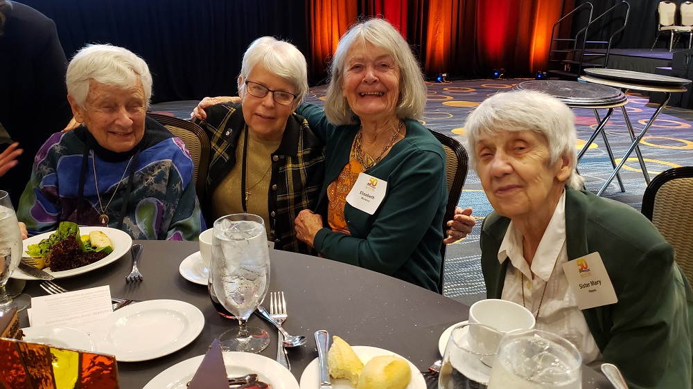 From left: Dominican Sr. Carol Coston, Network's founding executive director; Ursuline Sr. Angela Fitzpatrick; Elizabeth Morancy, a former Sister of Mercy; and Sr. Mary Hayes of the Sisters of Notre Dame de Namur