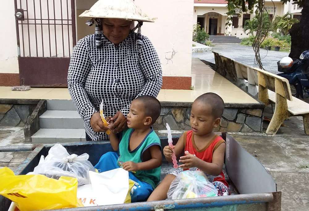 A 41-year-old woman in the Can Tho Diocese is pictured. She feeds her nine children by picking up scraps or bottles. (Mary Nguyen Thi Phuong Lan)