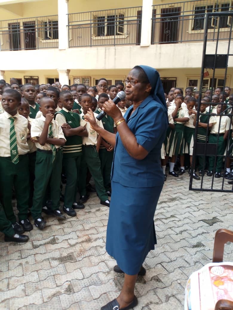 Sr. Bibiana Emenaha of the Daughters of Charity of St. Vincent de Paul speaks to students in February at a rural school in Edo on the dangers of trafficking. 
