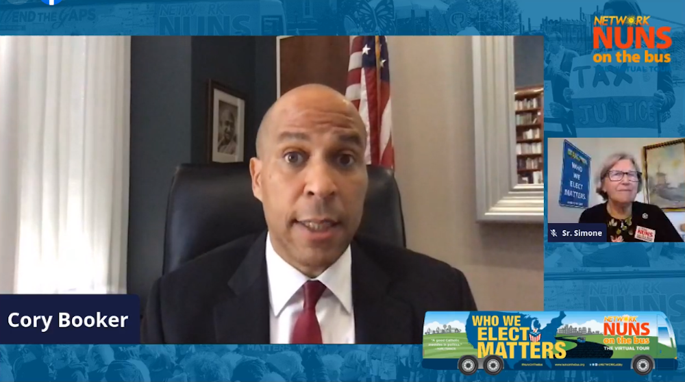 Sen. Cory Booker, a Democrat from New Jersey, addresses the virtual 2020 Nuns on the Bus kickoff Sept. 23. At right is Social Service Sr. Simone Campbell, executive director of Network, which organizes Nuns on the Bus. (Network screenshot) 