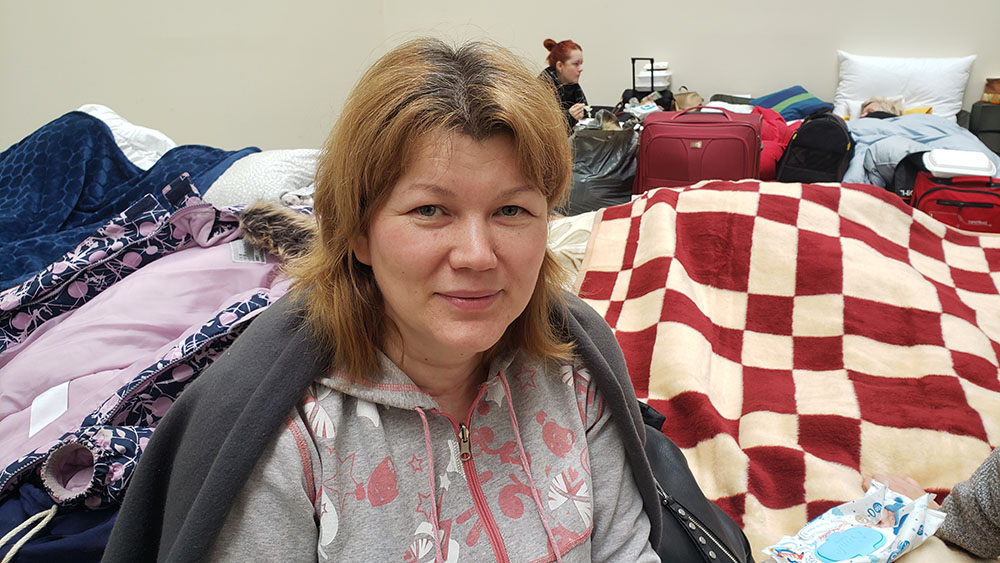 Olga, a refugee from Kharkiv, Ukraine, was headed to the Polish capital of Warsaw to be reunited with family living there. "We feel welcomed, certainly, yes," said Olga, praising the Polish welcome to the Ukrainian arrivals. (GSR photo/Chris Herlinger)