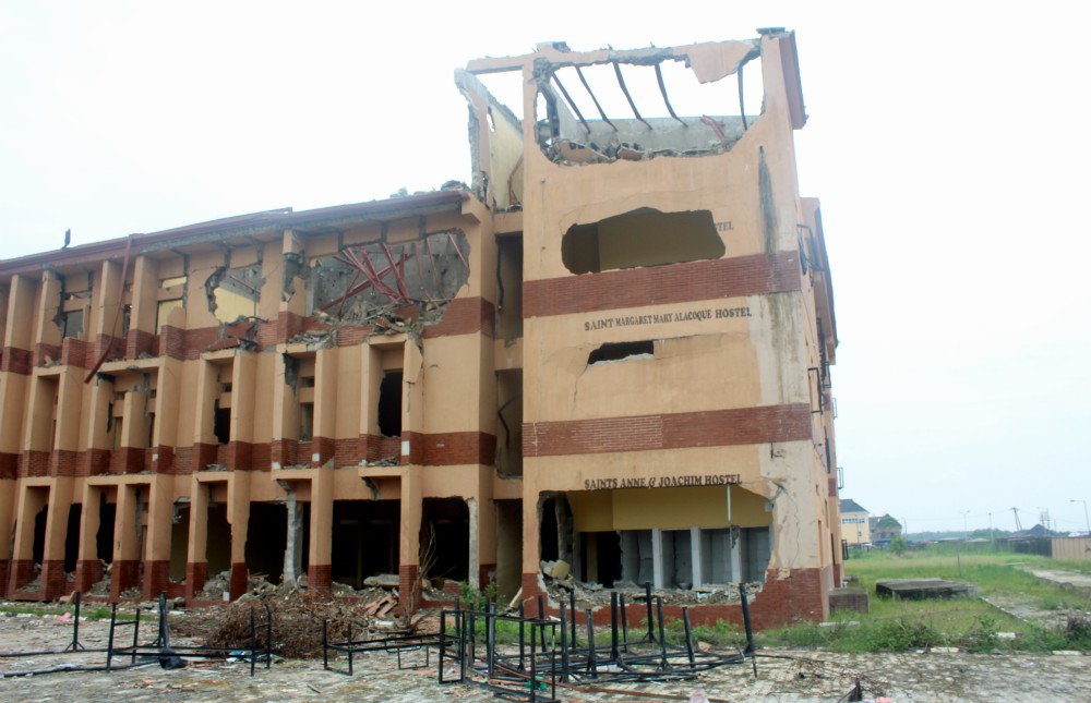 The classroom building of the Bethlehem Girls College was gutted after an explosion at a gas processing plant and ensuing fire killed at least 17 people and destroyed about 50 buildings and homes in a suburb of Lagos, Nigeria’s commercial capital. The classroom building of the Bethlehem Girls College was gutted after an explosion at a gas processing plant and ensuing fire killed at least 17 people and destroyed about 50 buildings and homes in a suburb of Lagos, Nigeria’s commercial capital.