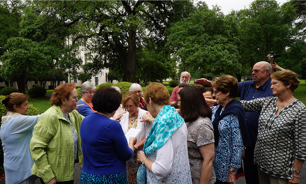 Associates of the Society of the Holy Child Jesus pray during a 2017 pilgrimage to the Grand Couteau, Louisiana, home of Cornelia Connelly, who founded the congregation in 1846. (Courtesy of the Society of the Holy Child Jesus)