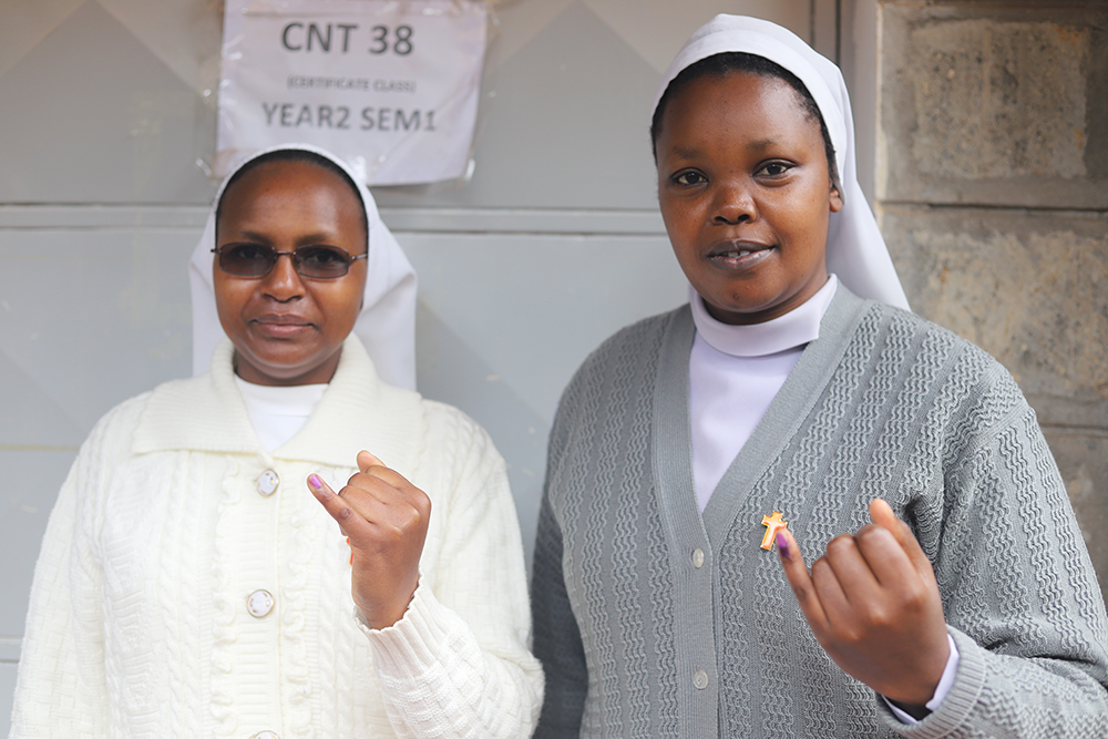 Religious sisters display their inked fingers after casting their ballot Aug. 9 inside a polling station at the Karen Kenya Medical Training College in Nairobi, Kenya. (GSR photo/Doreen Ajiambo)