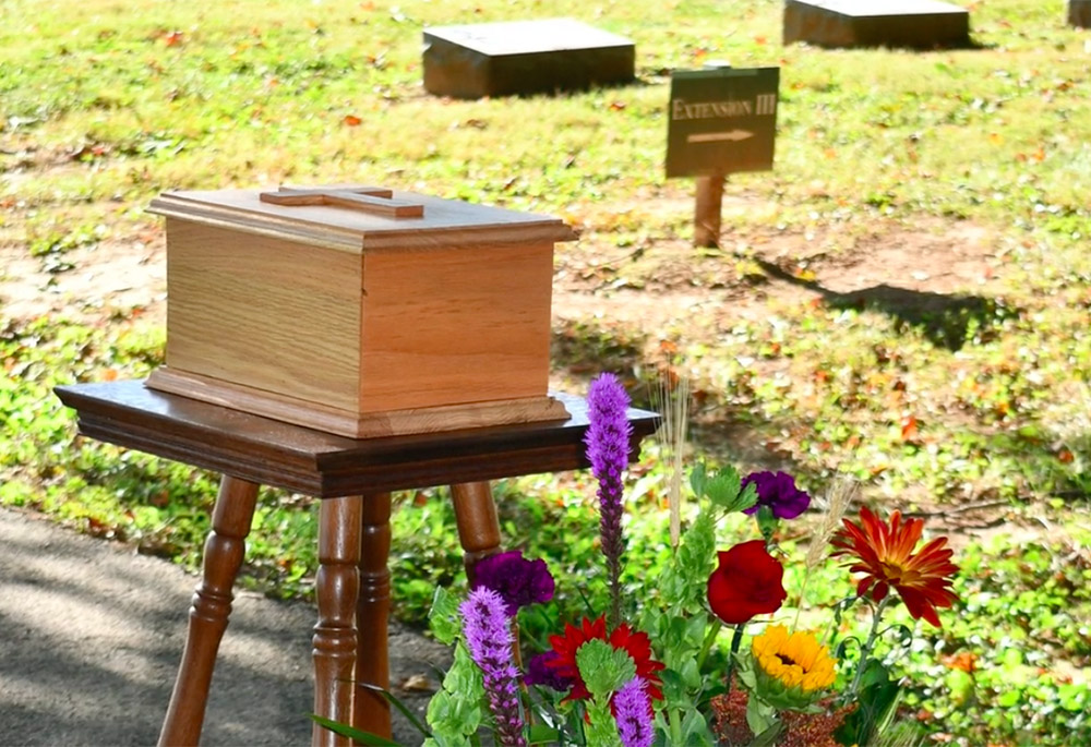 The ashes of Elaine McCarron, a Sister of Charity of Nazareth, sit in the foreground of the Nazareth's cemetery ahead of her burial in October 2020. (Courtesy of Sisters of Charity of Nazareth)