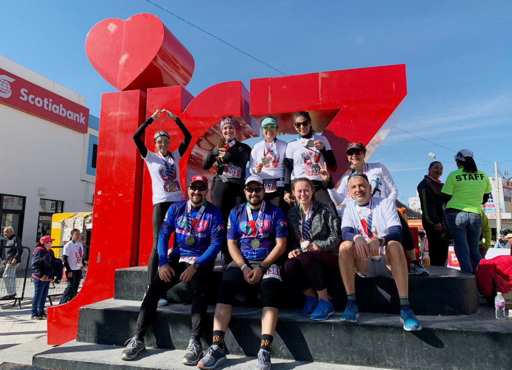 The running group celebrates the completion of our 10K Nov. 16 at a plaza in Ciudad Juárez, Mexico. (Provided photo) 