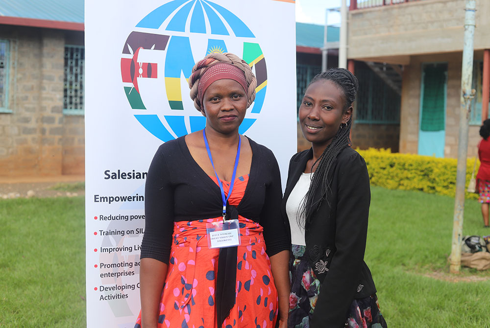 From left: Joyce Nyokabi, 34, and Damaris Wairimu, 32, interact after attending a conference on women empowerment in Makuyu village. The conference was organized by the Salesian Sisters of Don Bosco, which aims to help alleviate poverty among women and im From left: Joyce Nyokabi, 34, and Damaris Wairimu, 32, interact after attending a conference on women empowerment in Makuyu village. The conference was organized by the Salesian Sisters of Don Bosco, which aims to help alleviate poverty among women and im
