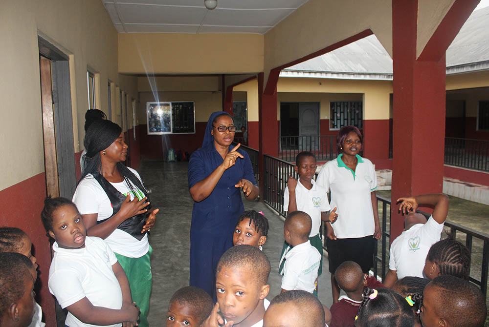 Sr. Scholastica Achinkumbur addresses students on the assembly ground at St. Vincent's Centre for Inclusive Education run by the Daughters of Charity of St. Vincent de Paul in Uyo, state capital of Akwa Ibom in Southern Nigeria. (Kelechukwu Iruoma)