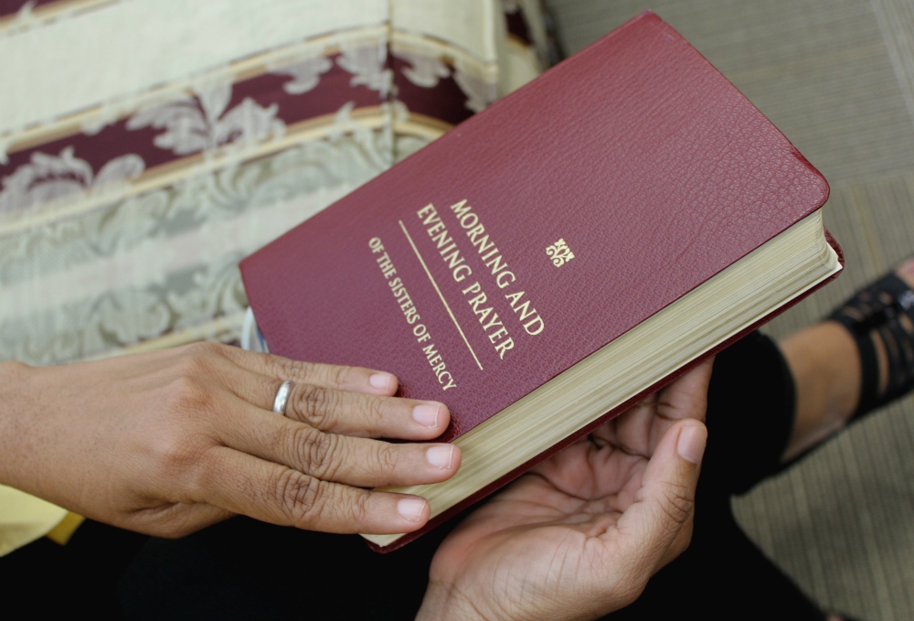 A Mercy sister uses the institute’s "Morning and Evening Prayer of the Sisters of Mercy." (Provided photo)