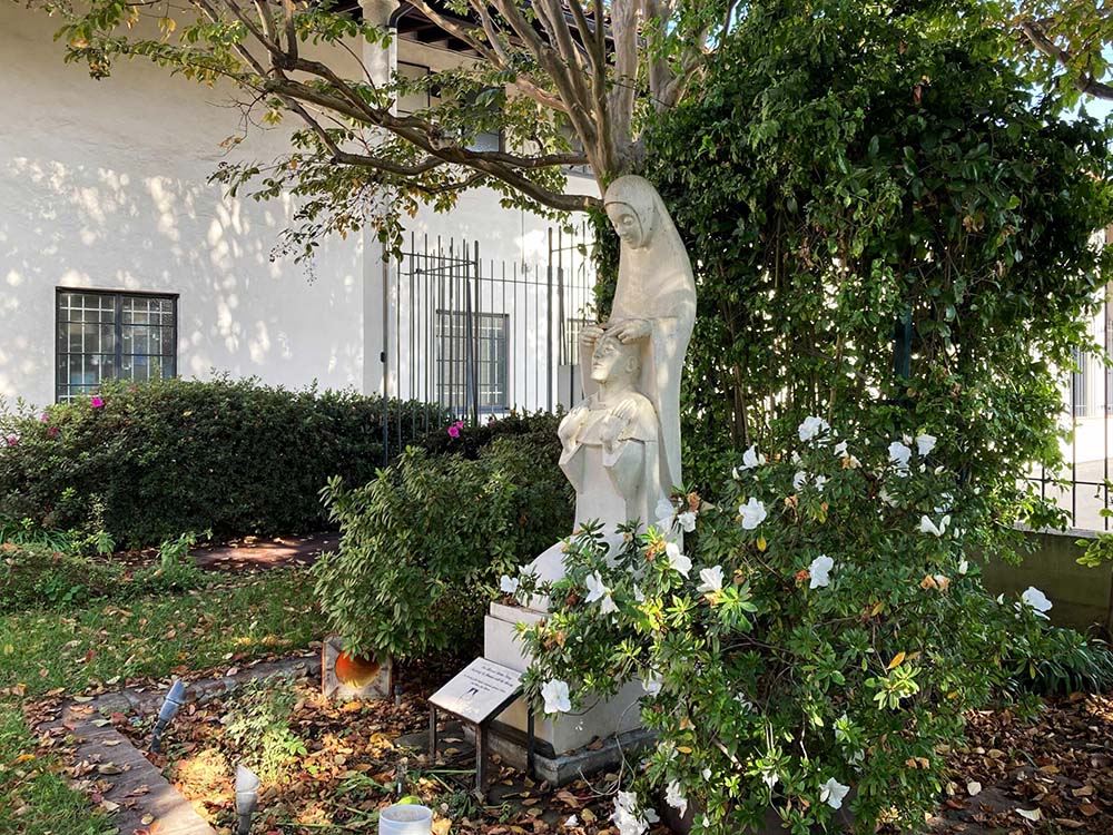 A statue of "Our Blessed Mother Mary Inspiring St. Dominic with the Rosary" stands at the Monastery of the Angels, a donation from the late actress Jane Wyman. (RNS/Alejandra Molina)