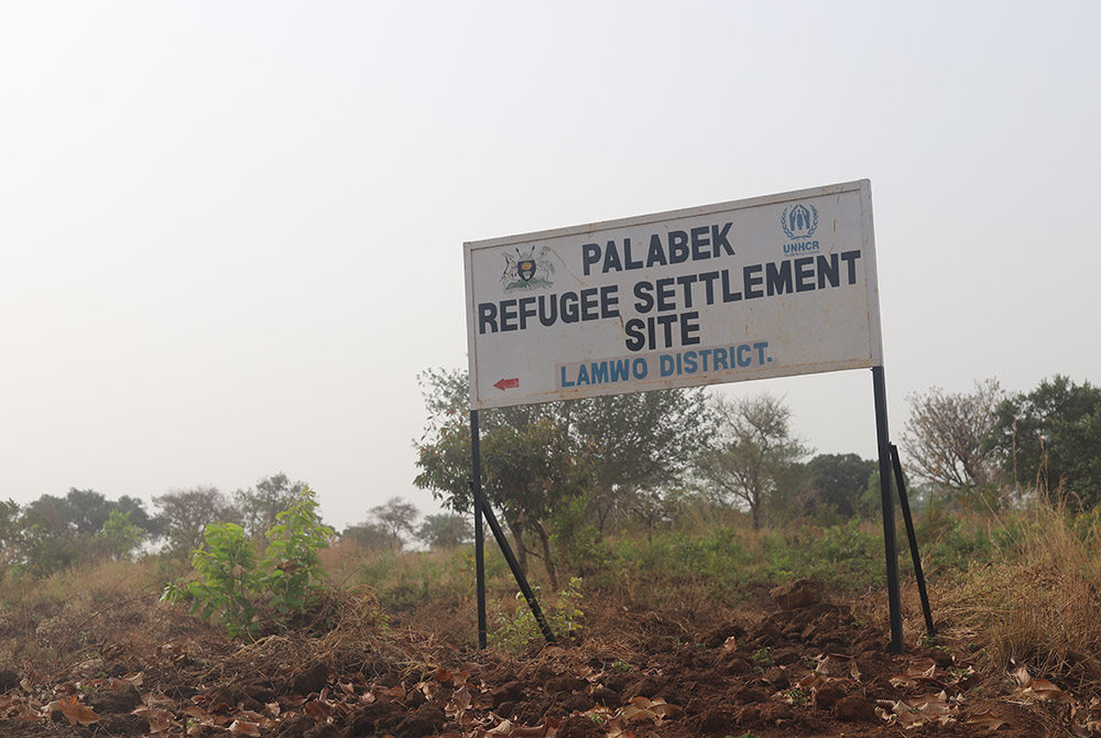 A signpost for Palabek refugee camp in northern Uganda. The camp is a home to more than 50,000 refugees from neighboring South Sudan, a country that descended into civil war in 2014 just a few years after independence. (GSR photo/Doreen Ajiambo) A signpost for Palabek refugee camp in northern Uganda. The camp is a home to more than 50,000 refugees from neighboring South Sudan, a country that descended into civil war in 2014 just a few years after independence. (GSR photo/Doreen Ajiambo)