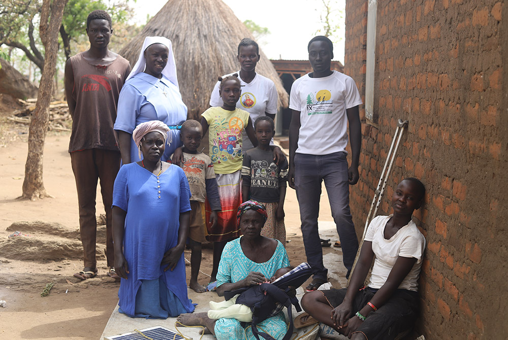 Sr. Lucy Akera visits refugees at Palabek camp Feb. 20 in northern Uganda. She trains and sensitizes refugees on the importance of farming. (GSR photo/Doreen Ajiambo)