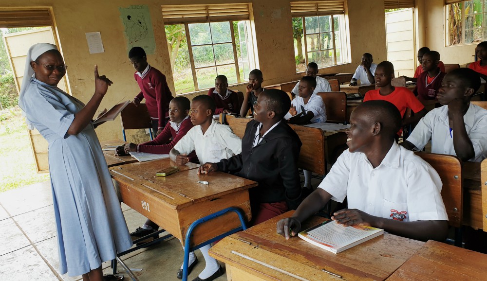 Sr. Rose Nelima interacts with students at Mbale School for the Deaf in Uganda. (Gerald Matembu)