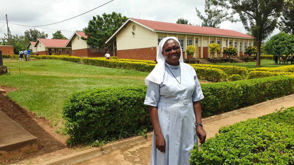 Sr. Rose Nelima on the grounds of Mbale School for the Deaf in Uganda (Gerald Matembu)