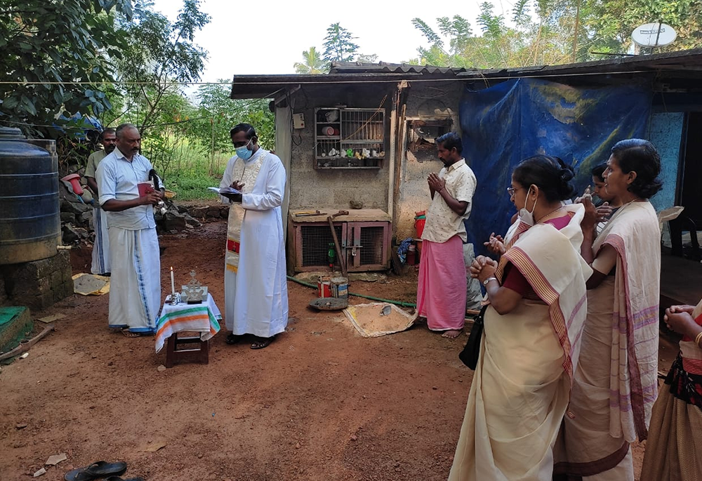 Local priests and sisters join the family to bless the cornerstone of the house (Courtesy of Rose Cherian Vachaparampil) Local priests and sisters join the family to bless the cornerstone of the house (Courtesy of Rose Cherian Vachaparampil)