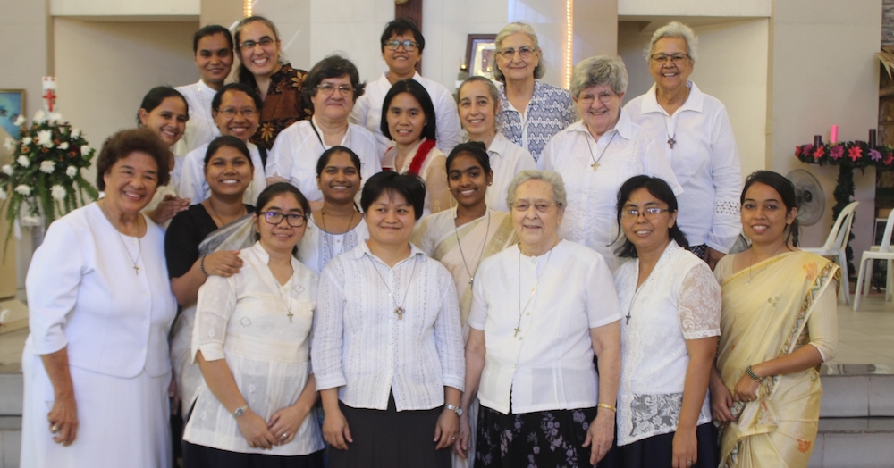 Congregation of the Sacred Hearts of Jesus and Mary sisters with Mother General Patricia Villarroel Garay and the vicar Aurora Laguarda during a final vows ceremony in the Philippines in May 2019 of first Filipina Sacred Heart sister, Ellen Buyuccan, cent Congregation of the Sacred Hearts of Jesus and Mary sisters with Mother General Patricia Villarroel Garay and the vicar Aurora Laguarda during a final vows ceremony in the Philippines in May 2019 of first Filipina Sacred Heart sister, Ellen Buyuccan, cent