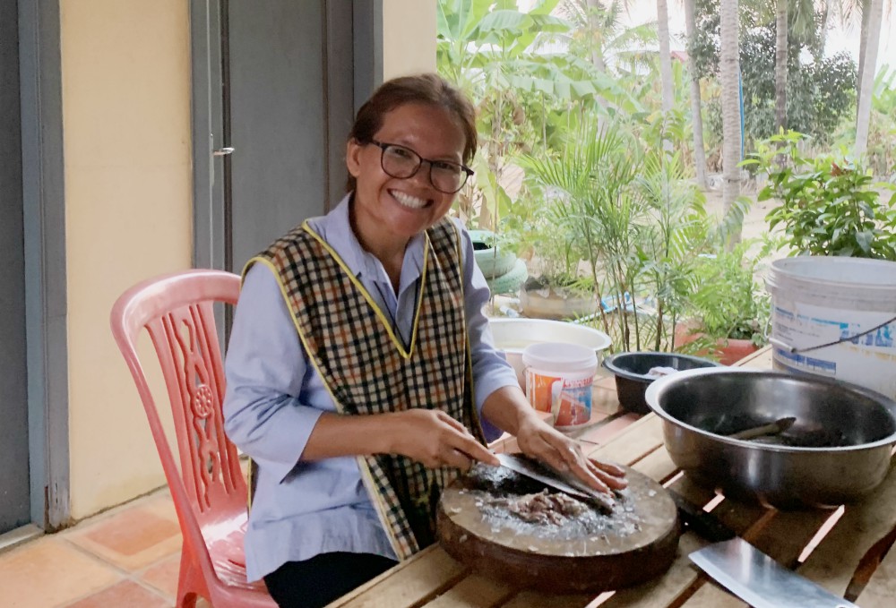 Most students are not Catholic, but that's never been important, says Lovers of the Holy Cross Sr. Hill Pen. "It's about spreading the love of Christ. I want to help people to know Jesus." (Akarath Soukhaphon)